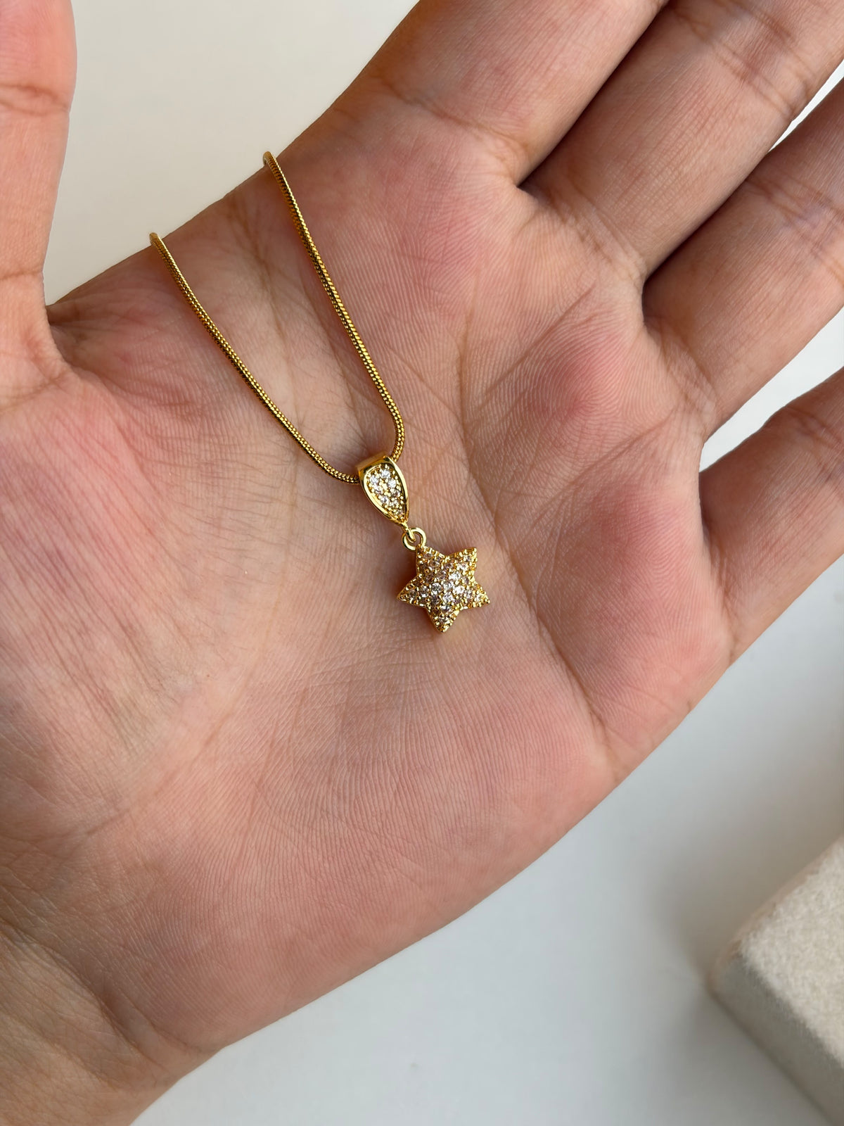 Studded star necklace